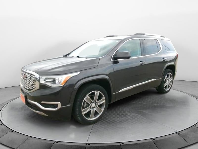 2017 GMC Acadia Denali in Iridium Metallic — front three-quarter view