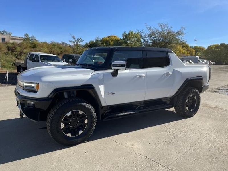 2023 GMC HUMMER EV Pickup 3X in Interstellar White — front three-quarter view