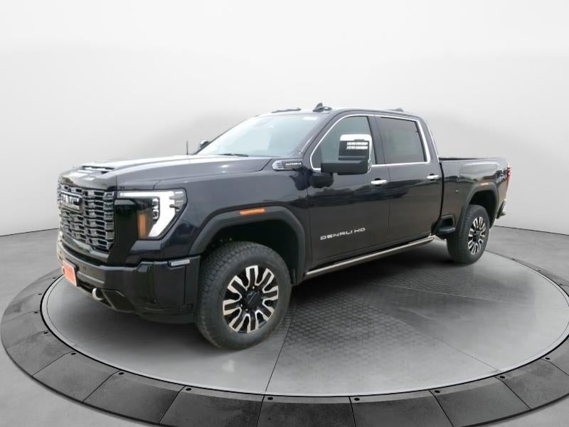 2026 GMC Sierra 2500 HD Denali Ultimate in Titanium Rush Metallic — front three-quarter view