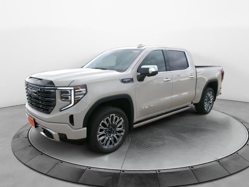 2026 GMC Sierra 1500 Denali Ultimate in Coastal Dune — front three-quarter view