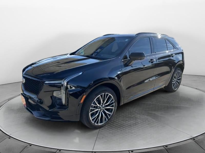 2024 Cadillac XT4 Sport in Stellar Black Metallic — front three-quarter view