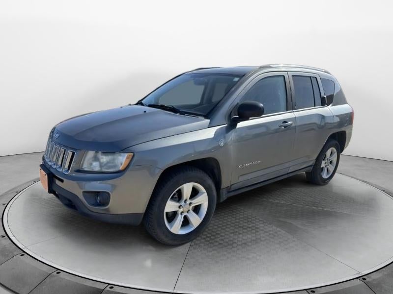 2011 Jeep Compass Latitude in Silver — front three-quarter view