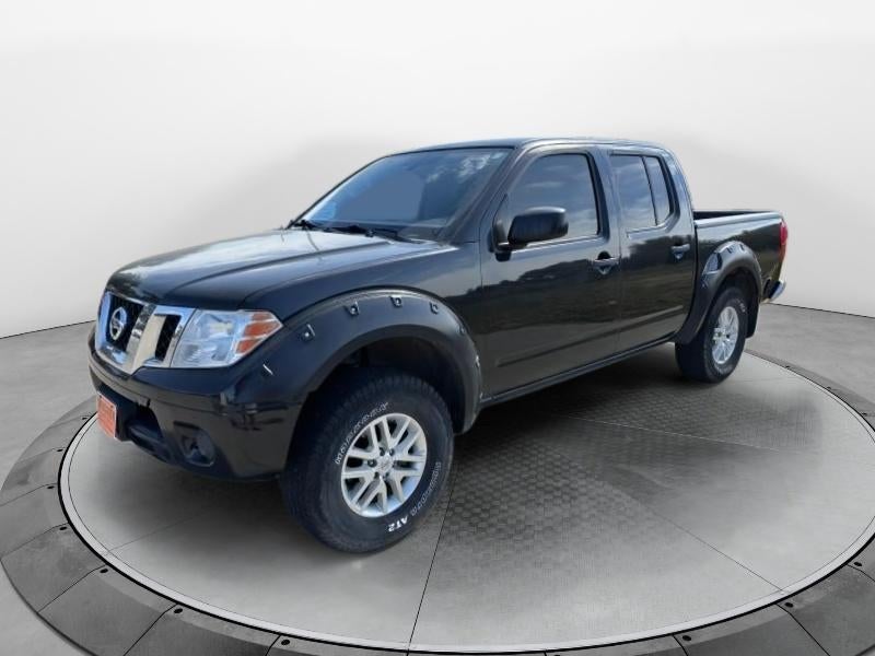 2019 Nissan Frontier SV in Black — front three-quarter view