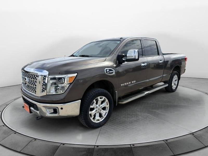 2016 Nissan Titan XD SL in Grey — front three-quarter view