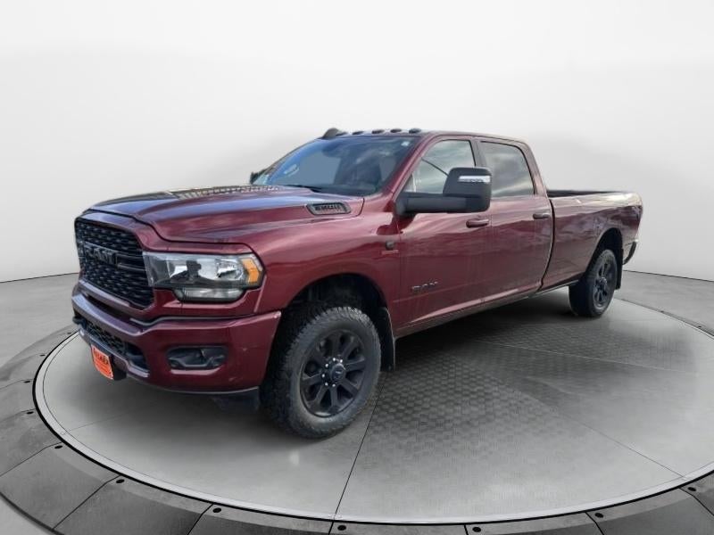 2023 RAM 3500 Big Horn in Red — front three-quarter view