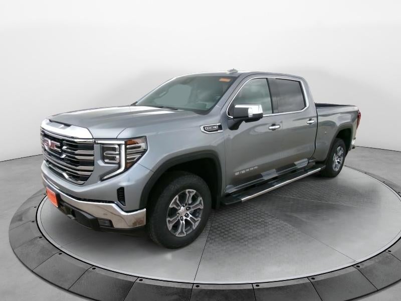 2026 GMC Sierra 1500 SLT in Sterling Metallic — front three-quarter view