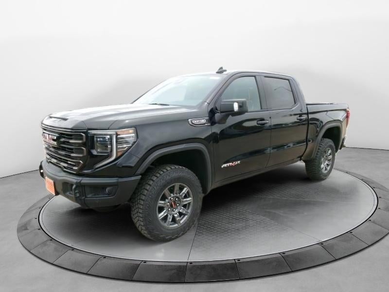 2026 GMC Sierra 1500 AT4X in Onyx Black — front three-quarter view