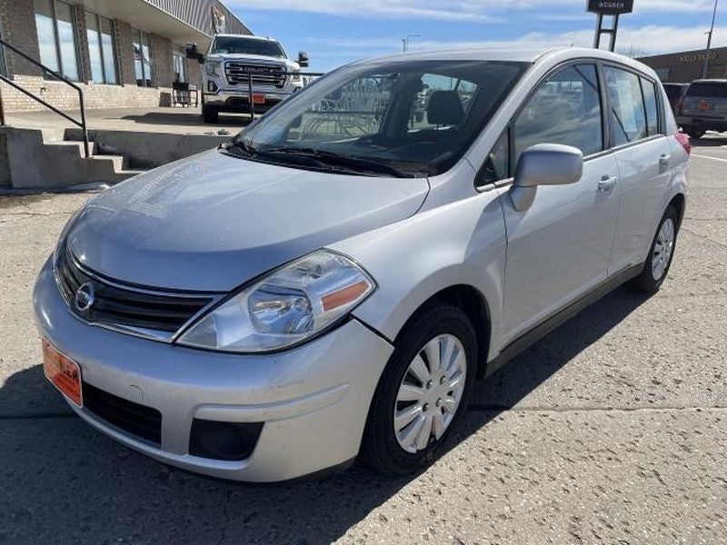 2011 Nissan Versa 1.8 S in Silver — front three-quarter view