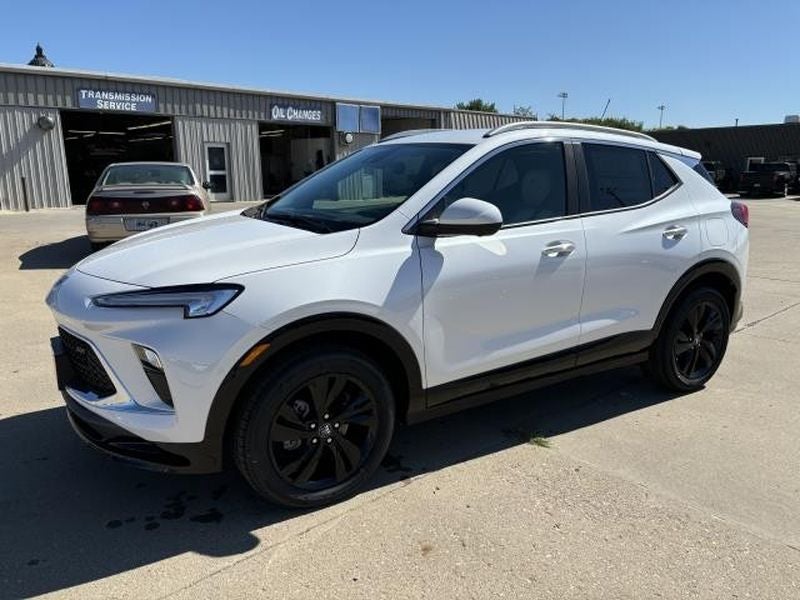 2024 Buick Encore GX Sport Touring in White Frost Tricoat — front three-quarter view